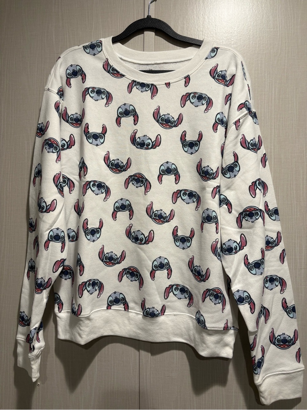 Disney White Crewneck Sweatshirt with Blue and Pink Stitch Allover Print